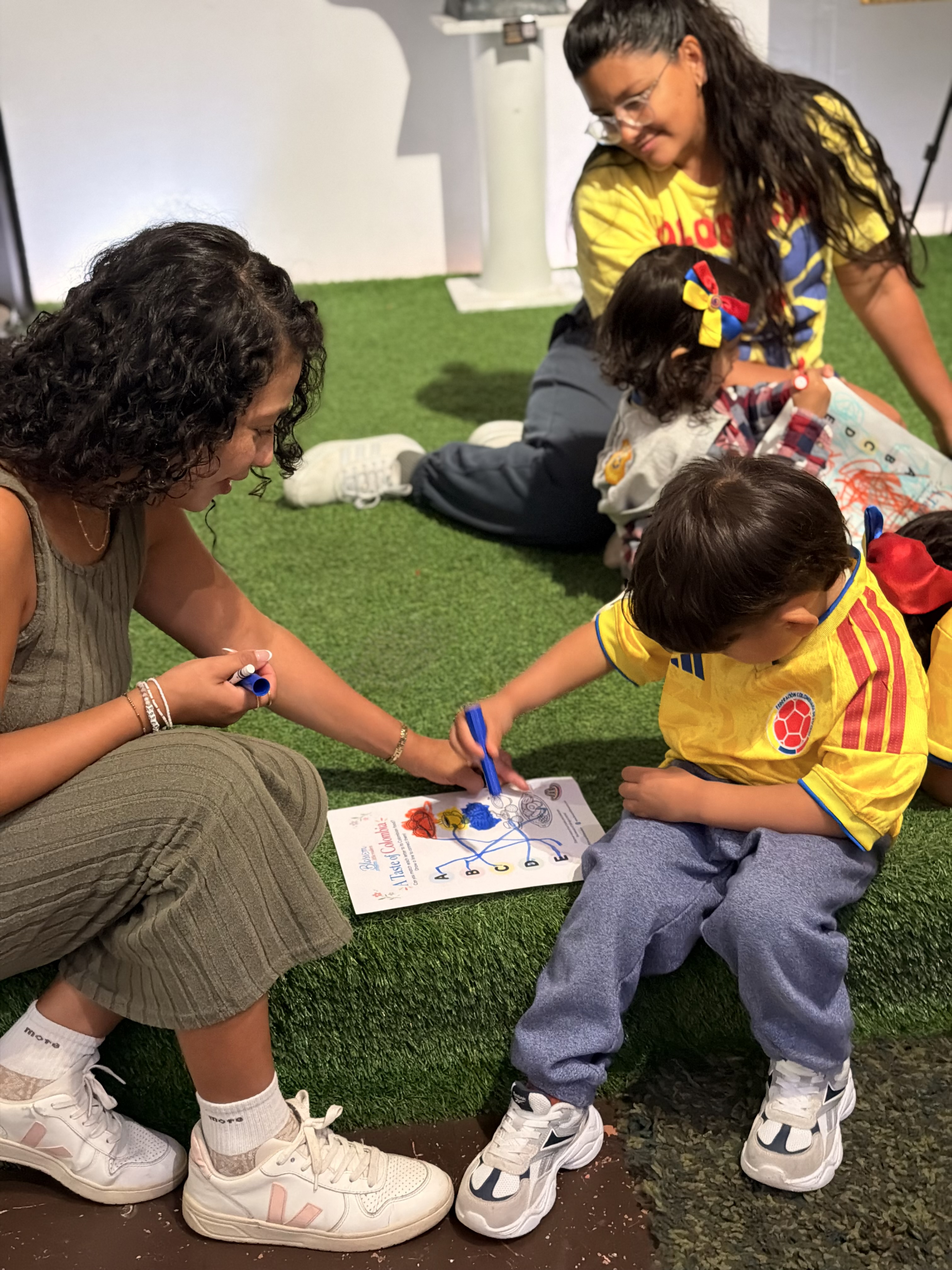 Blossom Little Readers book table at a community event
